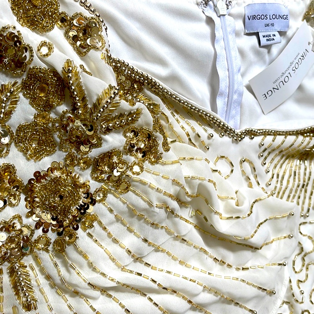 Beautiful VIRGOS LOUNGE dress in white with gold sequenced.